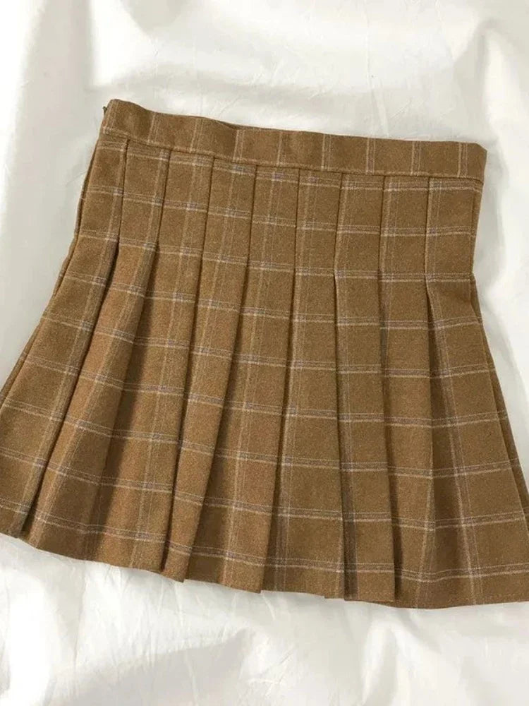 Conjunto vintage preppy feminino com colete de tricô, cardigã, gola boneca, camisa de manga comprida e saia plissada xadrez (peça única) para primavera e outono.